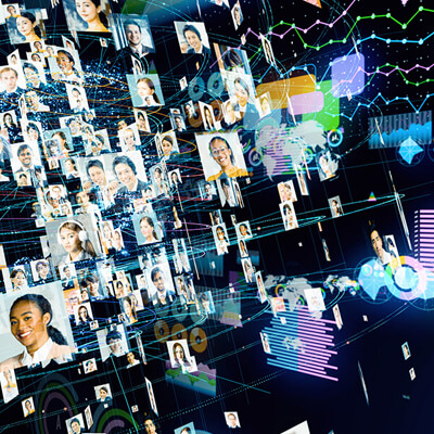 Futuristic image of charts, graphs and photos of diverse people, suggestive of big data, networks, research, technology.